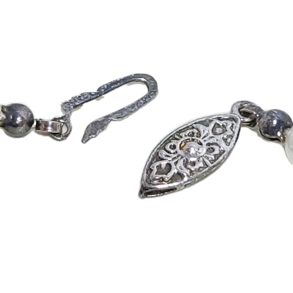 Vintage 16 Inch Faux Pearl Necklace With Ornate Clasp possibly silver. - Picture 5 of 12